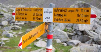 Hiking sign Alps Hiking sign Nufenenpass in the high Alps
