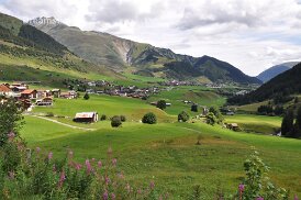 Valley in Alps Village in valley in Alps