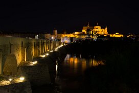 Mezquita and Roman bridge in Cordoba by night Mezquita and Roman bridge in Cordoba by night, Andalusia, Spain