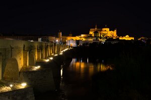 Mezquita and Roman bridge in Cordoba by night Mezquita and Roman bridge in Cordoba by night, Andalusia, Spain